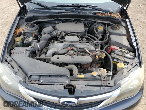 2009 Subaru Impreza i z VIN JF1GH61699H809109, wystawiony jako Copart lot #52859305 z przebiegiem 125 084 mil mil oraz Szkoda całkowita • Salvage title. Historia ofert i sprzedaży dostępna na DreamBid. Obrazek 11.