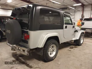 2005 Jeep Wrangler Unlimited with VIN 1J4FA44S05P359173, listed as a IAAI auction lot 41275179 with 75,035 mi miles. Bid and sale history available at carsss.com. Image 4.