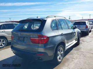 2007 BMW X5 3.0si with VIN 5UXFE43577L014625, listed as a IAAI auction lot 41325492 with 200,769 mi miles. Bid and sale history available at carsss.com. Image 4.