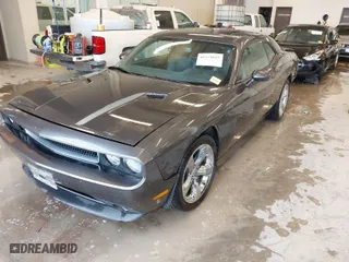 2013 Dodge Challenger SXT with VIN 2C3CDYAG9DH629189, listed as a IAAI auction lot 41374015 with 1 mi miles. Bid and sale history available at carsss.com. Image 2.