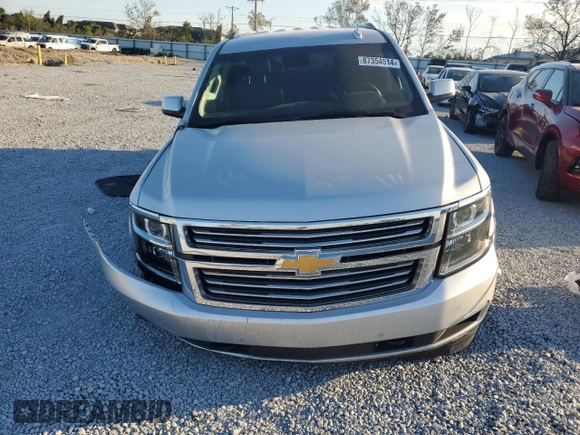 2020 Chevrolet Suburban Premier with VIN 1GNSCJKC9LR198484, listed as a Copart auction lot 87354514 with 115,008 mi miles and Salvage title. Bid and sale history available at DreamBid. Image 5.