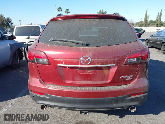 2014 Mazda CX-9 Grand Touring with VIN JM3TB3DV6E0435389, listed as a IAAI auction lot 41406200 with 181,598 mi miles and . Bid and sale history available at DreamBid. Image 16.