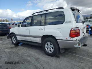 1999 Toyota Land Cruiser with VIN JT3HT05J7X0049786, listed as a Copart auction lot 45527005 with 199,447 mi miles and Salvage Title. Bid and sale history available at carsss.com. Image 2.