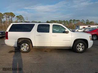 2012 Chevrolet Suburban LT with VIN 1GNSCJE06CR226677, listed as a IAAI auction lot 41403380 with 199,213 mi miles. Bid and sale history available at carsss.com. Image 13.