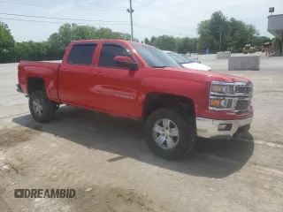 2015 Chevrolet Silverado 1500 LT with VIN 3GCUKREH8FG116887, listed as a Copart auction lot 54676424 with 112,097 mi miles and Salvage Title. Bid and sale history available at DreamBid. Image 4.