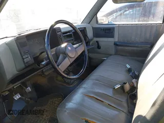 1986 GMC Sonoma with VIN 1GTBS14EXG2502284, listed as a IAAI auction lot 41273610 with 154,805 mi miles and . Bid and sale history available at DreamBid. Image 8.
