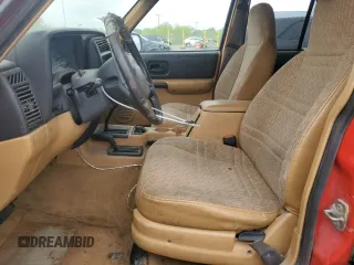 1998 Jeep Cherokee Sport z VIN 1J4FJ68S6WL279262, wystawiony jako Copart lot #56496635 z przebiegiem 160 176 mil mil oraz Czysty tytuł • Clean title. Historia ofert i sprzedaży dostępna na DreamBid. Obrazek 7.