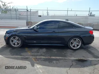 2014 BMW 4 Series 428i with VIN WBA3N7C55EF719504, listed as a IAAI auction lot 41403957 with 98,882 mi miles and . Bid and sale history available at carsss.com. Image 14.