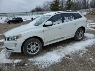 2015 Volvo XC60 T5 Drive-E with VIN YV440MDJXF2682987, listed as a Copart auction lot 87057354 with 140,959 mi miles and Clean Title. Bid and sale history available at carsss.com. Image 1.
