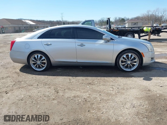 2013 Cadillac XTS Luxury with VIN 2G61R5S34D9233991, listed as a IAAI auction lot 41825533 with 152,706 mi miles. Bid and sale history available at carsss.com. Image 13.
