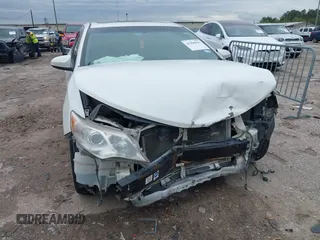 2012 Toyota Camry L with VIN 4T1BF1FK8CU624319, listed as a IAAI auction lot 41900045 with 193,234 mi miles and . Bid and sale history available at DreamBid. Image 6.