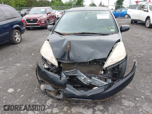 2009 Honda Fit Sport with VIN JHMGE88469S055316, listed as a IAAI auction lot 42306333 with 144,377 mi miles and . Bid and sale history available at DreamBid. Image 6.