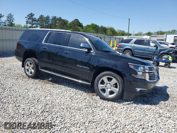 2018 Chevrolet Suburban Premier with VIN 1GNSCJKC1JR199271, listed as a Copart auction lot 52395935 with 216,083 mi miles and Salvage Title. Bid and sale history available at DreamBid. Image 4.