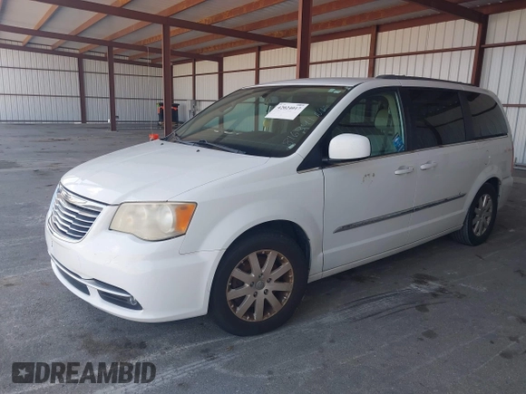 2013 Chrysler Town & Country Touring with VIN 2C4RC1BG3DR816341, listed as a IAAI auction lot 42024017 with 154,787 mi miles and . Bid and sale history available at DreamBid. Image 2.