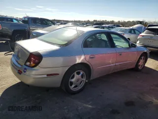 2001 Oldsmobile Aurora z VIN 1G3GS64C614157056, wystawiony jako Copart lot #88938065 z przebiegiem 121 688 mil mil oraz Szkody całkowita. Historia ofert i sprzedaży dostępna na DreamBid. Obrazek 3.