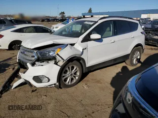 2018 Ford Escape SE with VIN 1FMCU0G98JUB62583, listed as a Copart auction lot 87894835 with 135,965 mi miles and Clean Title. Bid and sale history available at carsss.com. Image 1.