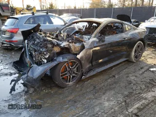 2023 Ford Mustang GT with VIN 1FA6P8CF4P5306058, listed as a Copart auction lot 38869544 with 0 mi miles and Salvage Title. Bid and sale history available at carsss.com. Image 1.