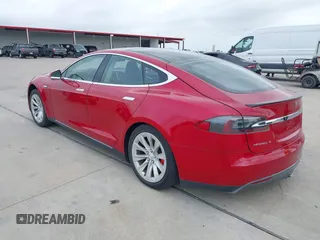 2014 Tesla Model S 60 with VIN 5YJSA1H17EFP30148, listed as a IAAI auction lot 39188024 with Not Provided miles and . Bid and sale history available at DreamBid. Image 3.
