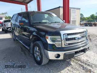 2014 Ford F-150 XL with VIN 1FTFW1ET2EFC86567, listed as a IAAI auction lot 41846669 with 255,942 mi miles. Bid and sale history available at carsss.com. Image 1.