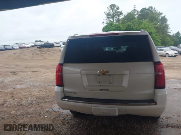 2015 Chevrolet Tahoe LTZ with VIN 1GNSCCKC1FR265370, listed as a IAAI auction lot 42131294 with 217,064 mi miles and . Bid and sale history available at DreamBid. Image 16.