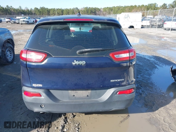 2015 Jeep Cherokee Sport with VIN 1C4PJLAB2FW547371, listed as a IAAI auction lot 41588682 with 135,640 mi miles. Bid and sale history available at carsss.com. Image 16.