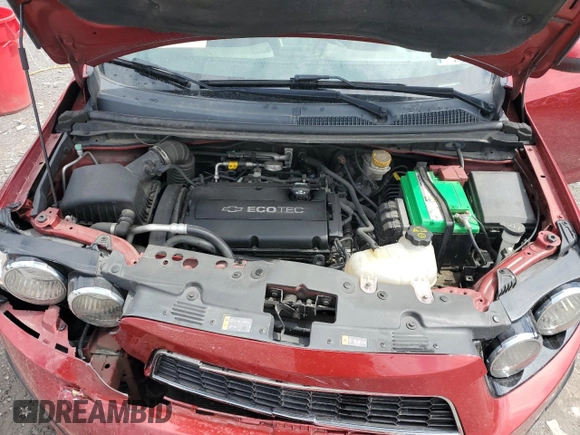 2016 Chevrolet Sonic LT z VIN 1G1JC5SG4G4175558, wystawiony jako Copart lot #57991275 z przebiegiem 133 497 mil mil oraz Szkoda całkowita • Salvage title. Historia ofert i sprzedaży dostępna na DreamBid. Obrazek 11.