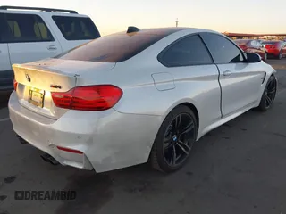 2016 BMW M4 with VIN WBS3R9C58GK336100, listed as a IAAI auction lot 41151151 with Not provided miles and . Bid and sale history available at DreamBid. Image 4.