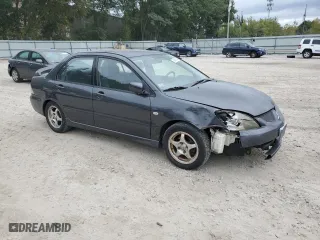 2004 Mitsubishi Lancer OZ-Rally with VIN JA3AJ86E04U029594, listed as a Copart auction lot 73143284 with 71,623 mi miles and Clean Title. Bid and sale history available at carsss.com. Image 4.