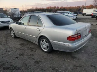 2000 Mercedes-Benz E-Class with VIN WDBJF70J7YB049473, listed as a Copart auction lot 82396624 with 197,515 mi miles and Salvage Title. Bid and sale history available at carsss.com. Image 2.