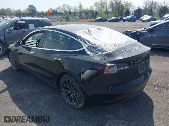 2019 Tesla Model 3 Mid Range with VIN 5YJ3E1EA0KF394514, listed as a IAAI auction lot 42080985 with Not Provided miles and . Bid and sale history available at DreamBid. Image 3.