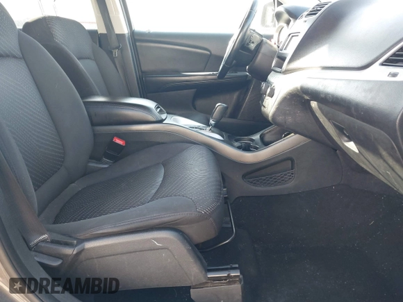 2014 Dodge Journey SE with VIN 3C4PDCAB0ET283756, listed as a IAAI auction lot 41490472 with 122,695 mi miles. Bid and sale history available at carsss.com. Image 5.