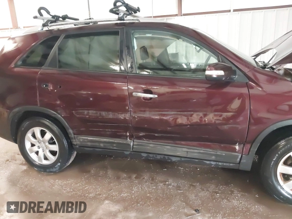 2013 Kia Sorento LX with VIN 5XYKT4A27DG315059, listed as a IAAI auction lot 41571574 with 217,527 mi miles. Bid and sale history available at carsss.com. Image 6.