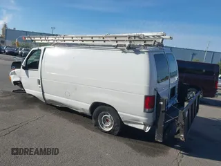 2000 Ford Econoline Cargo with VIN 1FTRE1427YHA09155, listed as a IAAI auction lot 41544236 with 32,275 mi miles. Bid and sale history available at carsss.com. Image 3.