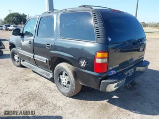 2003 Chevrolet Tahoe LT with VIN 1GNEC13Z33R166971, listed as a IAAI auction lot 41356669 with 318,527 mi miles. Bid and sale history available at carsss.com. Image 3.