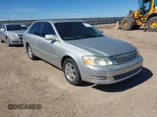 2002 Toyota Avalon XL z VIN 4T1BF28B32U212729, wystawiony jako IAAI lot #42208393 z przebiegiem 173 650 mil mil oraz . Historia ofert i sprzedaży dostępna na DreamBid. Obrazek 1.