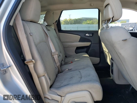 2012 Dodge Journey SXT z VIN 3C4PDDBG0CT293331, wystawiony jako Copart lot #62602995 z przebiegiem 185 605 mil mil oraz Szkoda całkowita • Salvage title. Historia ofert i sprzedaży dostępna na DreamBid. Obrazek 11.