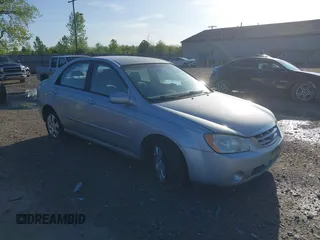 2006 Kia Spectra EX with VIN KNAFE121265312420, listed as a IAAI auction lot 42085732 with 59,641 mi miles. Bid and sale history available at carsss.com. Image 1.