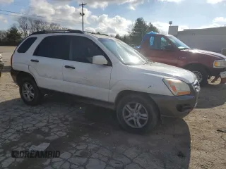 2006 Kia Sportage LX with VIN KNDJF723467205078, listed as a Copart auction lot 86888074 with 231,886 mi miles and Salvage Title. Bid and sale history available at DreamBid. Image 4.