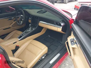 2018 Porsche 911 Carrera with VIN WP0AA2A92JS106143, listed as a IAAI auction lot 42009215 with 36,754 mi miles and . Bid and sale history available at DreamBid. Image 5.