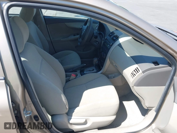 2010 Toyota Corolla with VIN 1NXBU4EE1AZ310799, listed as a IAAI auction lot 42672763 with 174,970 mi miles and . Bid and sale history available at DreamBid. Image 5.