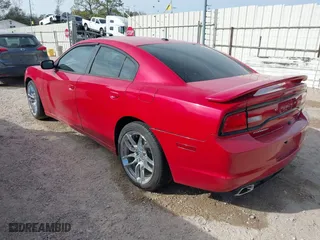 2011 Dodge Charger RT Plus with VIN 2B3CL5CT3BH512648, listed as a IAAI auction lot 41273976 with 185,560 mi miles. Bid and sale history available at carsss.com. Image 3.