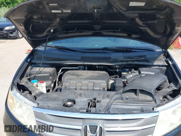 2011 Honda Odyssey Touring with VIN 5FNRL5H97BB073708, listed as a IAAI auction lot 42409164 with 141,986 mi miles and . Bid and sale history available at DreamBid. Image 10.