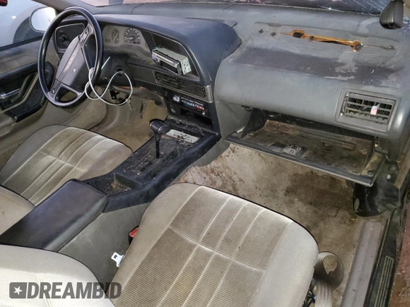 1989 Ford Thunderbird z VIN 1FAPP6047KH147586, wystawiony jako Copart lot #81057294 z przebiegiem 249 369 mil mil oraz Szkoda całkowita • Salvage title. Historia ofert i sprzedaży dostępna na DreamBid. Obrazek 8.