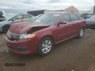 2009 Kia Optima LX z VIN KNAGE228395313765, wystawiony jako Copart lot #59707675 z przebiegiem 170 773 mil mil oraz Szkoda całkowita • Salvage title. Historia ofert i sprzedaży dostępna na DreamBid. Obrazek 1.