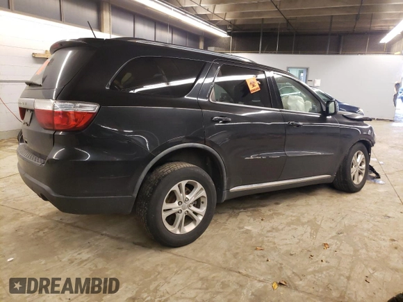 2012 Dodge Durango SXT z VIN 1C4RDJAG8CC198214, wystawiony jako Copart lot #52154065 z przebiegiem 128 787 mil mil oraz Nie do naprawy • Non repairable. Historia ofert i sprzedaży dostępna na DreamBid. Obrazek 3.