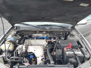 2001 Toyota Camry CE z VIN 4T1BG22K01U028448, wystawiony jako IAAI lot #42324384 z przebiegiem 190 325 mil mil oraz . Historia ofert i sprzedaży dostępna na DreamBid. Obrazek 10.