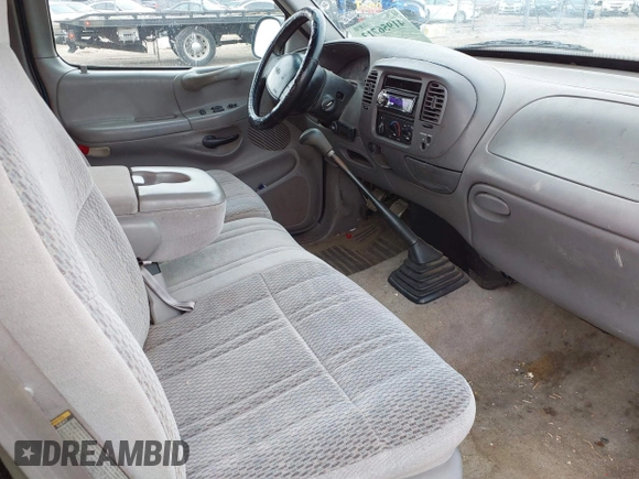 1997 Ford F-150 with VIN 2FTDX1720VCA73590, listed as a IAAI auction lot 41956713 with 128,220 mi miles and . Bid and sale history available at DreamBid. Image 5.