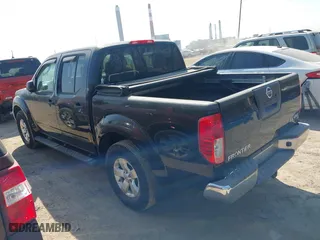 2011 Nissan Frontier PRO-4X with VIN 1N6AD0EV3BC409198, listed as a IAAI auction lot 41793467 with 177,192 mi miles. Bid and sale history available at carsss.com. Image 3.