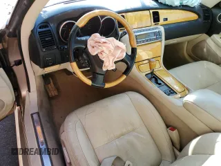 2002 Lexus SC 430 z VIN JTHFN48Y520005046, wystawiony jako Copart lot #49508605 z przebiegiem 126 933 mil mil oraz Szkody całkowita. Historia ofert i sprzedaży dostępna na DreamBid. Obrazek 8.
