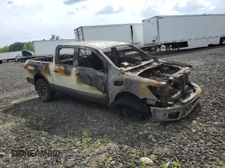 2017 Nissan Titan Pro-4X with VIN 1N6AA1E55HN517107, listed as a Copart auction lot 50836265 with Not provided miles and Non repairable. Bid and sale history available at DreamBid. Image 4.